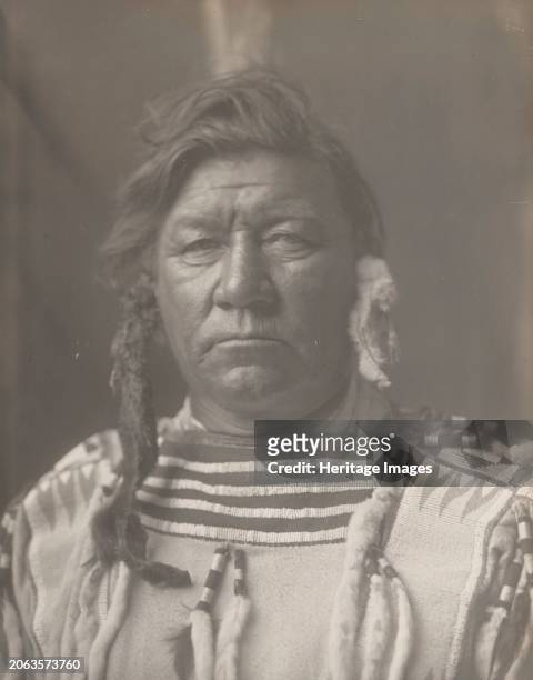 John Wallace, 1908. Photograph shows head-and-shoulders portrait of John Wallace, wearing traditional clothing, seated, facing front. Creator: Edward...