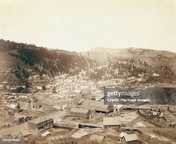 Deadwood, [SD] from McGovern Hill, 1888. Bird's-eye view of small city; trees and mountains in background. Creator: John C. H. Grabill.
