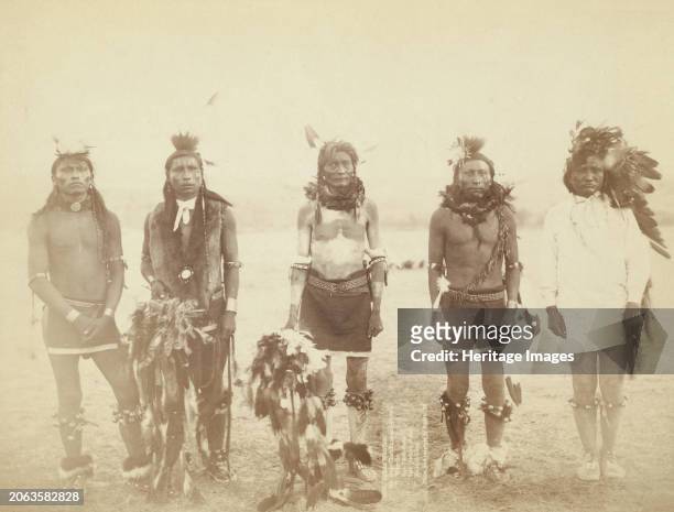 Indian Warriors. Mr. Bear-that-Runs-and-Growls, Mr. Warrior, Mr. One-Tooth-Gone, Mr. Sole , Mr. Make-it-Long []. Five Grass dancers in ceremonial...