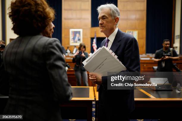 Federal Reserve Bank Chairman Jerome Powell visits with House Financial Services Committee ranking member Rep. Maxine Waters following a hearing in...