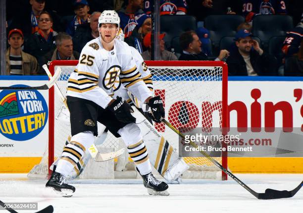 Brandon Carlo of the Boston Bruins skates against the New York Islanders at UBS Arena on March 02, 2024 in Elmont, New York.