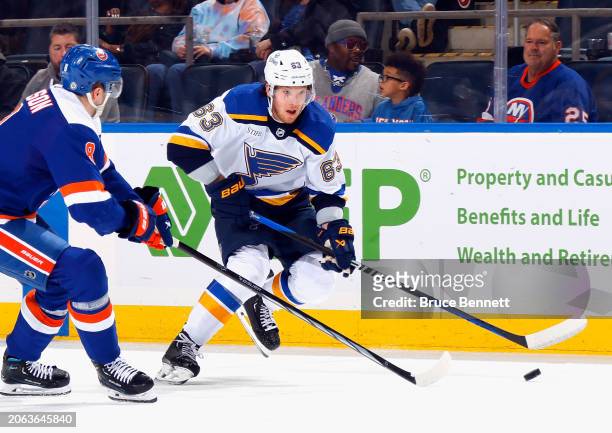 Jake Neighbours of the St. Louis Blues skates against the New York Islanders at UBS Arena on March 05, 2024 in Elmont, New York.