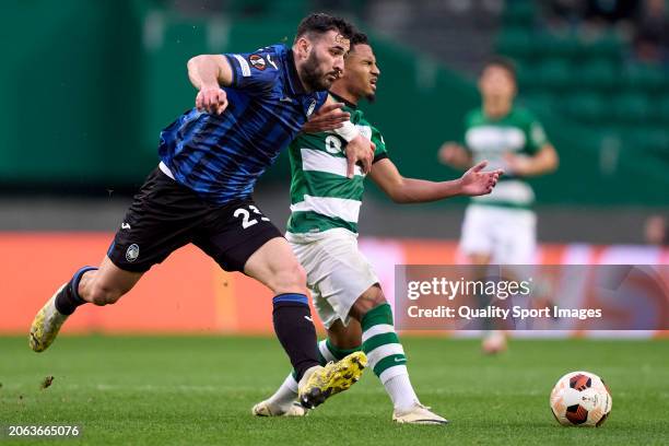 Sead Kolasinac of Atalanta competes for the ball with Marcus Edwards of Sporting CP during the UEFA Europa League 2023/24 round of 16 first leg match...