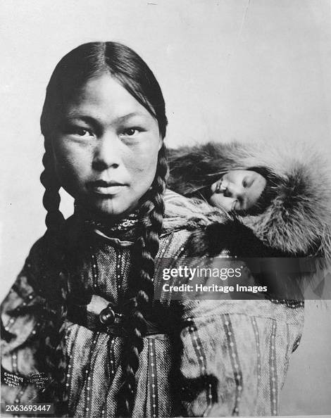 Eskimo Mother With Child On Back