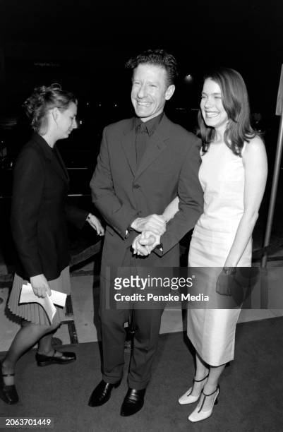 Lyle Lovett and April Kimble attend the local premiere of "Cookie's Fortune" at Cineplex Odeon Showcase Cinemas in Los Angeles, California, on March...