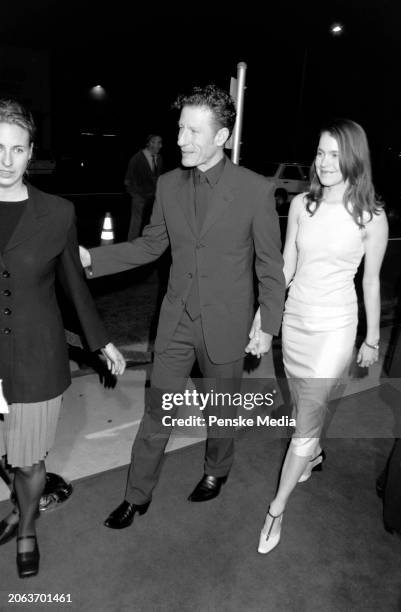 Lyle Lovett and April Kimble attend the local premiere of "Cookie's Fortune" at Cineplex Odeon Showcase Cinemas in Los Angeles, California, on March...