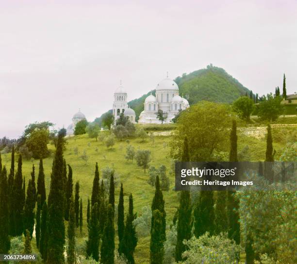 View from the south, Novyi Afon [monastery], between 1905 and 1915. The New Athos Monastery with cypress trees in foreground, Abkhazia. Russian...