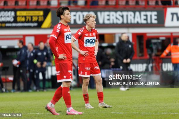 Kortrijk's Ryotaro Tsunoda and Kortrijk's Dion De Neve look dejected after losing a soccer match between KV Kortrijk and Royal Antwerp FC, Saturday...