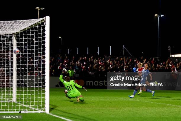 Stina Blackstenius of Arsenal scores her team's first goal past Anna Leat of Aston Villa during the FA Women's Continental Tyres League Cup Semi...