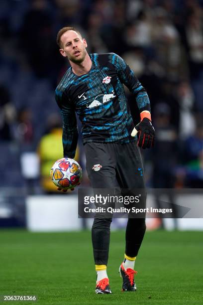 Peter Gulacsi of RB Leipzig warms up prior to the UEFA Champions League 2023/24 round of 16 second leg match between Real Madrid CF and RB Leipzig at...