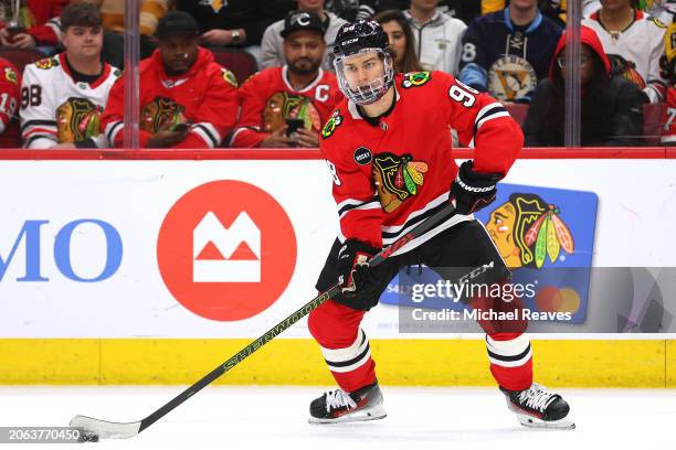 Connor Bedard of the Chicago Blackhawks controls the puck against the Pittsburgh Penguins during the second period at the United Center on February...