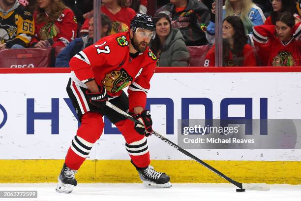 Nick Foligno of the Chicago Blackhawks controls the puck against the Pittsburgh Penguins during the second period at the United Center on February...