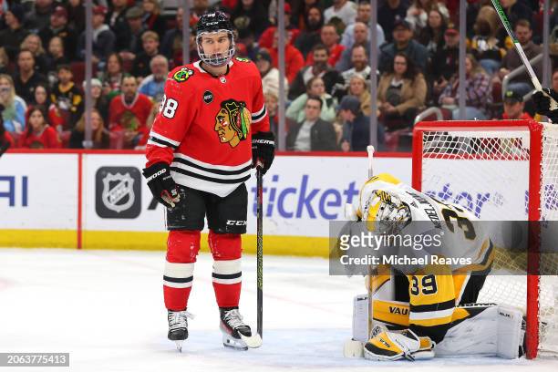 Connor Bedard of the Chicago Blackhawks reacts after Alex Nedeljkovic of the Pittsburgh Penguins saved a shot on goal during the second period at the...