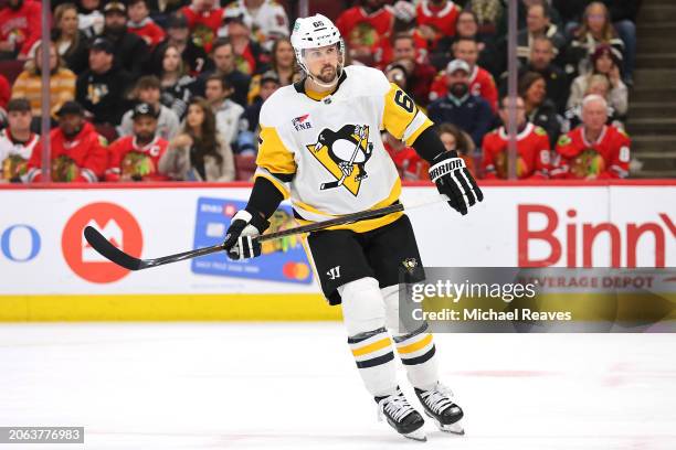 Erik Karlsson of the Pittsburgh Penguins looks on against the Chicago Blackhawks during the second period at the United Center on February 15, 2024...