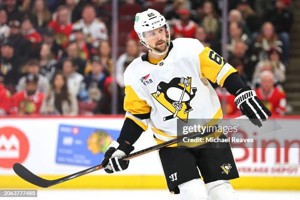 Erik Karlsson of the Pittsburgh Penguins looks on against the Chicago Blackhawks during the second period at the United Center on February 15, 2024...