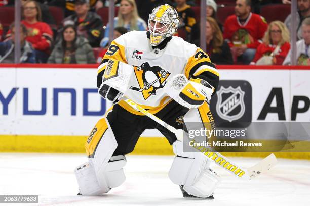 Alex Nedeljkovic of the Pittsburgh Penguins looks on against the Chicago Blackhawks during the second period at the United Center on February 15,...