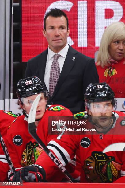 Head coach Luke Richardson of the Chicago Blackhawks looks on against the Pittsburgh Penguins during the first period at the United Center on...