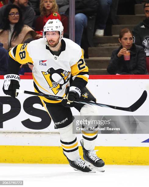 Marcus Pettersson of the Pittsburgh Penguins skates against the Chicago Blackhawks during the first period at the United Center on February 15, 2024...