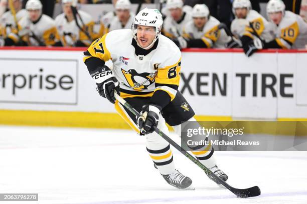 Sidney Crosby of the Pittsburgh Penguins skates with the puck against the Chicago Blackhawks during the first period at the United Center on February...