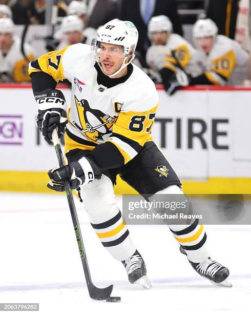 Sidney Crosby of the Pittsburgh Penguins skates with the puck against the Chicago Blackhawks during the first period at the United Center on February...