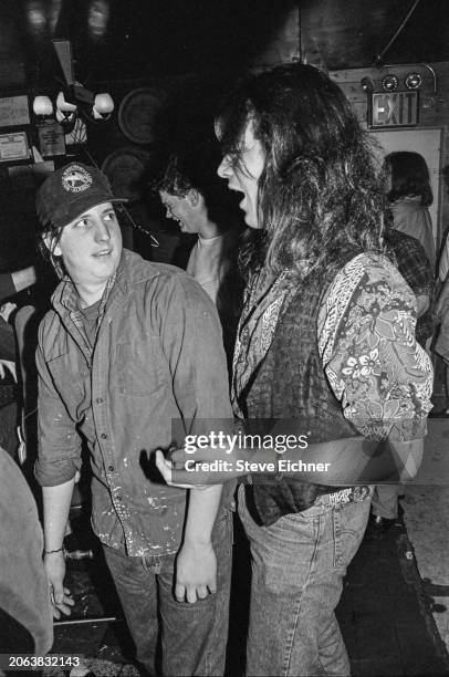 American Rock musicians Bobby Sheehan and Chan Kinchla, both of the group Blues Traveler, talk together at the Nightingale bar, New York, New York,...