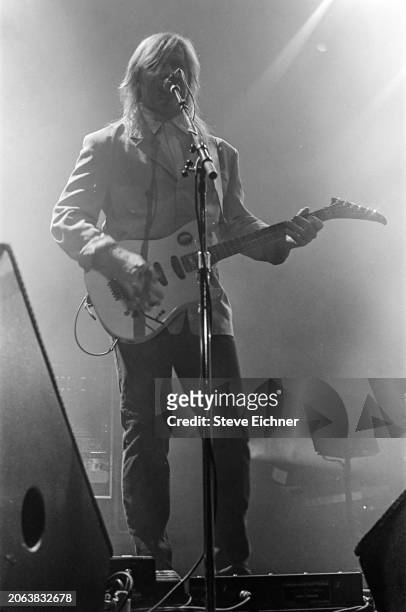 Canadian Rock musician Alex Lifeson, of the group Rush, plays electric guitar as he performs onstage at Nassau Coliseum , Uniondale, New York, April...