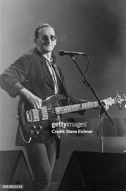 Canadian Rock musician Geddy Lee, of the group Rush, plays bass guitar as he performs onstage at Nassau Coliseum , Uniondale, New York, April 22,...