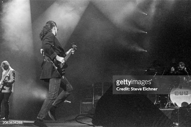 Canadian Rock musician Geddy Lee, of the group Rush, plays bass guitar as he performs onstage at Nassau Coliseum , Uniondale, New York, April 22,...