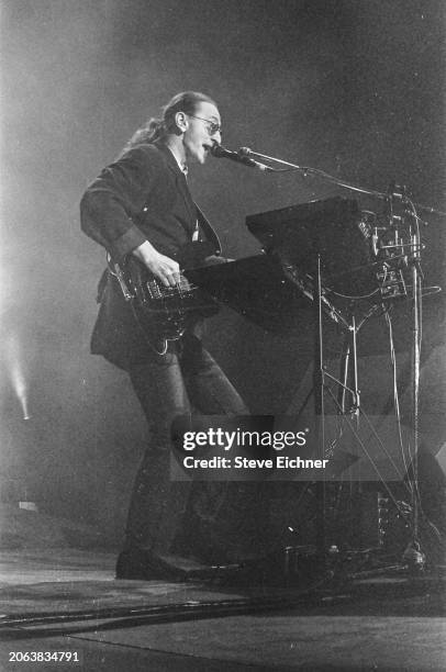 Canadian Rock musician Geddy Lee, of the group Rush, plays keyboards as he performs onstage at Nassau Coliseum , Uniondale, New York, April 22, 1990.