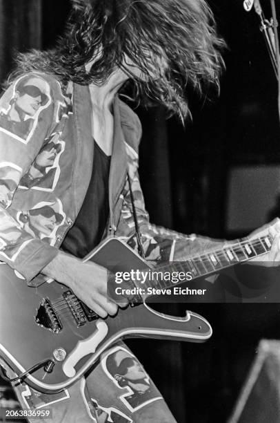 American Rock musician Paul Gilbert, of the group Mr Big, plays electric guitar as he performs onstage at Nassau Coliseum , Uniondale, New York,...