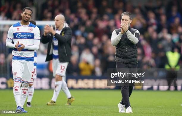 Chris Willock and manager Martí Cifuentes of Queens Park Rangers applaud the fans after the Sky Bet Championship match between Queens Park Rangers...