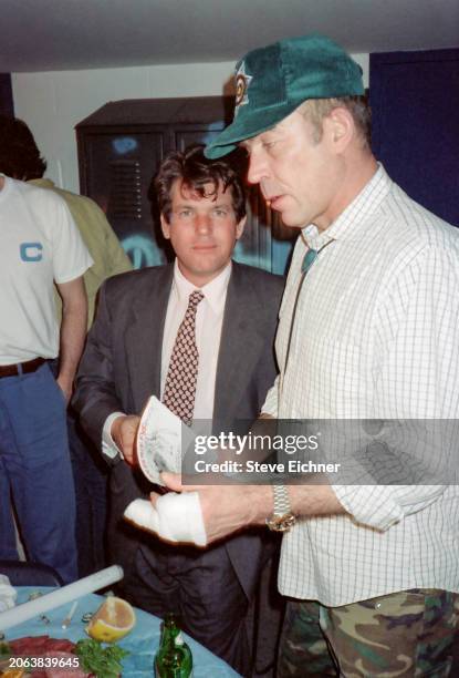 View of American magazine publisher & Rolling Stone co-founder Jann Wenner and journalist & author Hunter S Thompson backstage during an appearance...