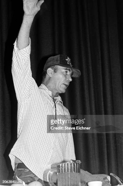 American journalist & author Hunter S Thompson waves from the stage as he speaks at Columbia University, New York, New York, April 18, 1990.