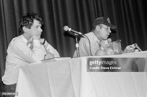 View of American magazine publisher & Rolling Stone co-founder Jann Wenner and journalist & author Hunter S Thompson onstage during an appearance at...