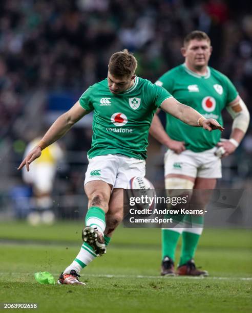 Jack Crowley of Ireland successfully kicks a penalty to put his side 12-8 ahead just before half-time during the Guinness Six Nations 2024 match...