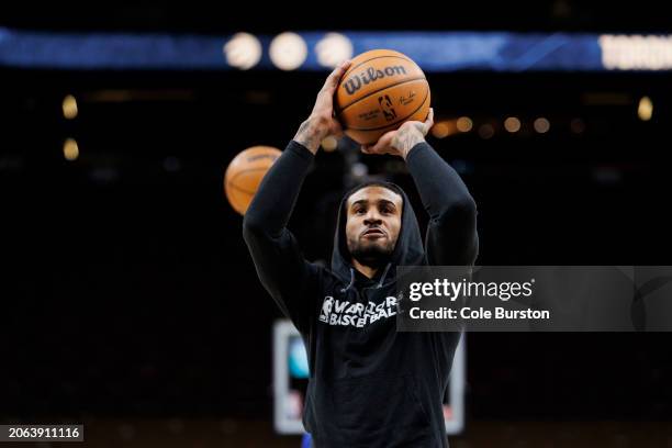 Gary Payton II of the Golden State Warriors warms up ahead of their NBA game against the Toronto Raptors at Scotiabank Arena on March 1, 2024 in...