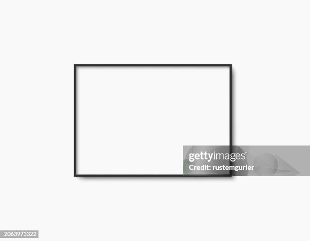 empty horizontal black photo frame template on white background - picture frame mockup stock illustrations