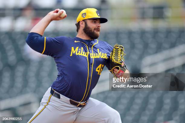 Bryse Wilson of the Milwaukee Brewers throws in the first inning during a spring training game against the Cincinnati Reds at Goodyear Ballpark on...