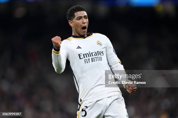 Jude Bellingham of Real Madrid celebrates after Vinicius Junior of Real Madrid scores his team's first goal during the UEFA Champions League 2023/24...