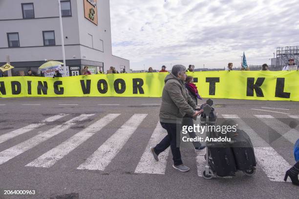 Environmental activist group Extinction Rebellion XR and local residents hold a protest at the Maastricht Aachen Airport, demanding a ban on private...