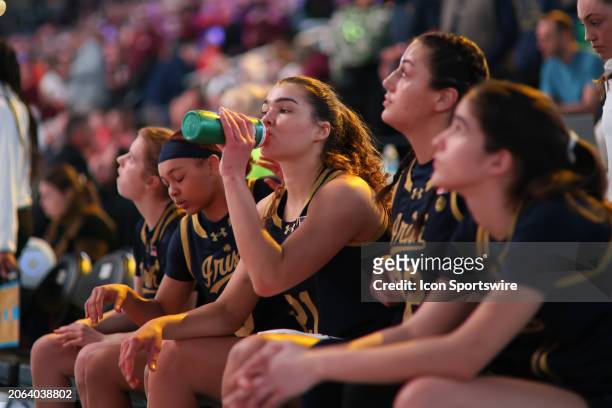 Notre Dame Fighting Irish forward Maddy Westbeld drinks water while waiting to be announced during the college basketball game between the Notre Dame...