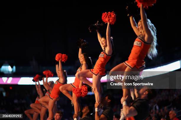 The Virginia Tech Hokies cheerleaders are held in the air during player introductions during the college basketball game between the Notre Dame...