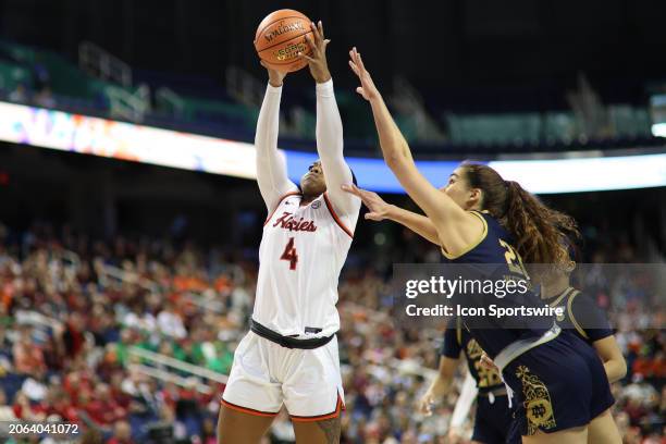 Virginia Tech Hokies forward Rose Micheaux and Notre Dame Fighting Irish forward Maddy Westbeld go up for the rebound during the college basketball...