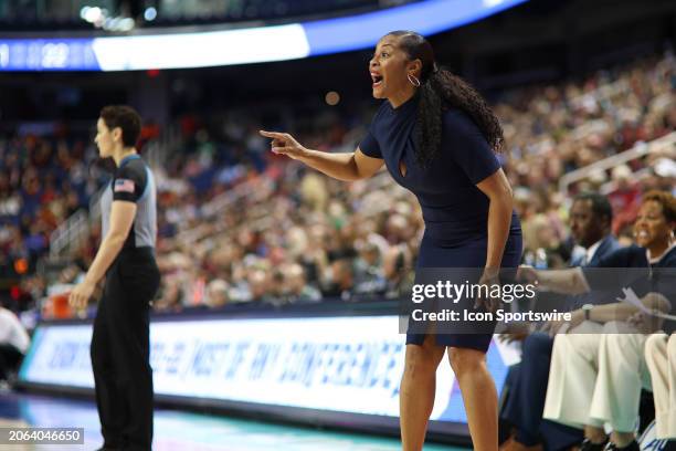 Notre Dame Fighting Irish head coach Niele Ivey yells to her team during the college basketball game between the Notre Dame Fighting Irish and...