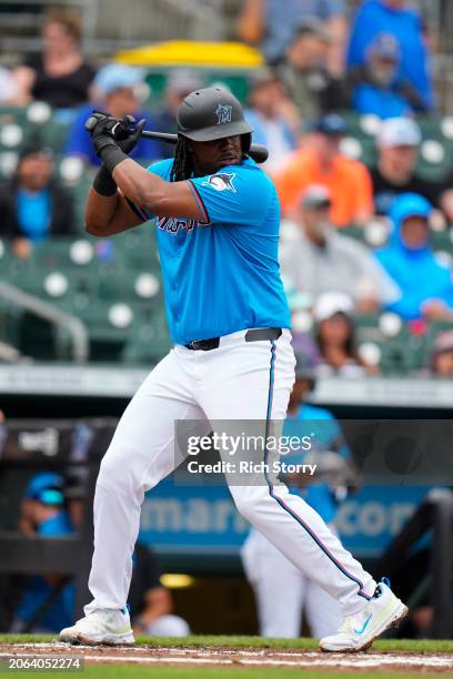 Josh Bell of the Miami Marlins at bat during a spring training game against the Washington Nationals at Roger Dean Stadium on March 06, 2024 in...