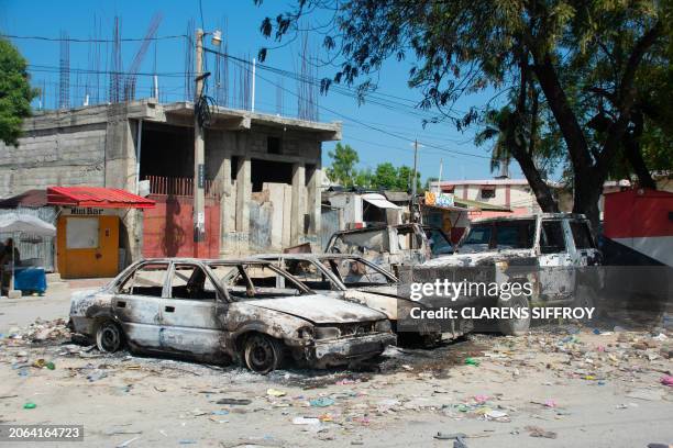 Charred vehicles remain parked as gang violence escalates in Port-au-Prince, Haiti, on March 9, 2024. Sporadic gunfire rang out in Port-au-Prince...