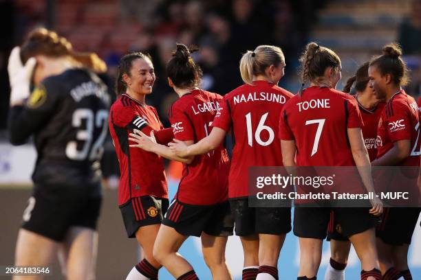 Lucia Garcia of Manchester United celebrates with her team-mates during the Adobe Women's FA Cup Quarter Final match between Brighton & Hove Albion...