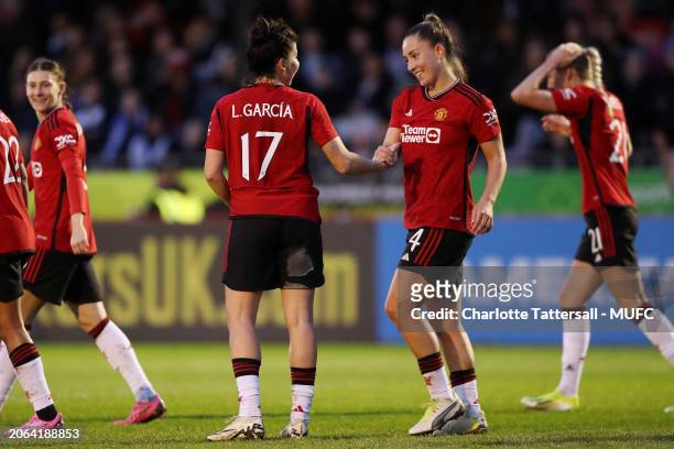 Lucia Garcia of Manchester United celebrates with her team-mate Maya Le Tissier during the Adobe Women's FA Cup Quarter Final match between Brighton...
