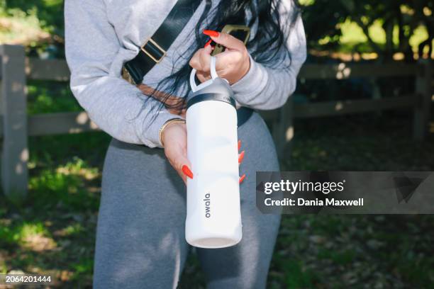 Los Angeles, CA Denai Blackshire poses for a portrait with her Owala branded water bottle at Runyon Canyon on Monday, Jan. 8, 2024 in Los Angeles,...