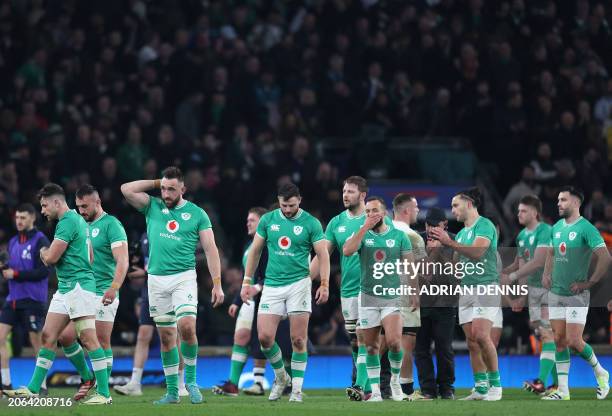 Ireland players react after losing the Six Nations international rugby union match between England and Ireland at Twickenham Stadium in south-west...